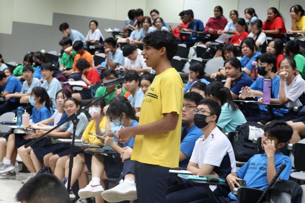 A student posing a question during the Q&A session.